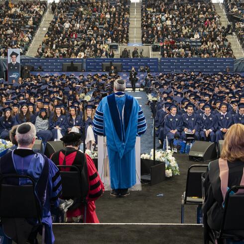 President Ari Berman addressing the audience aty YU's 2025 Commencement